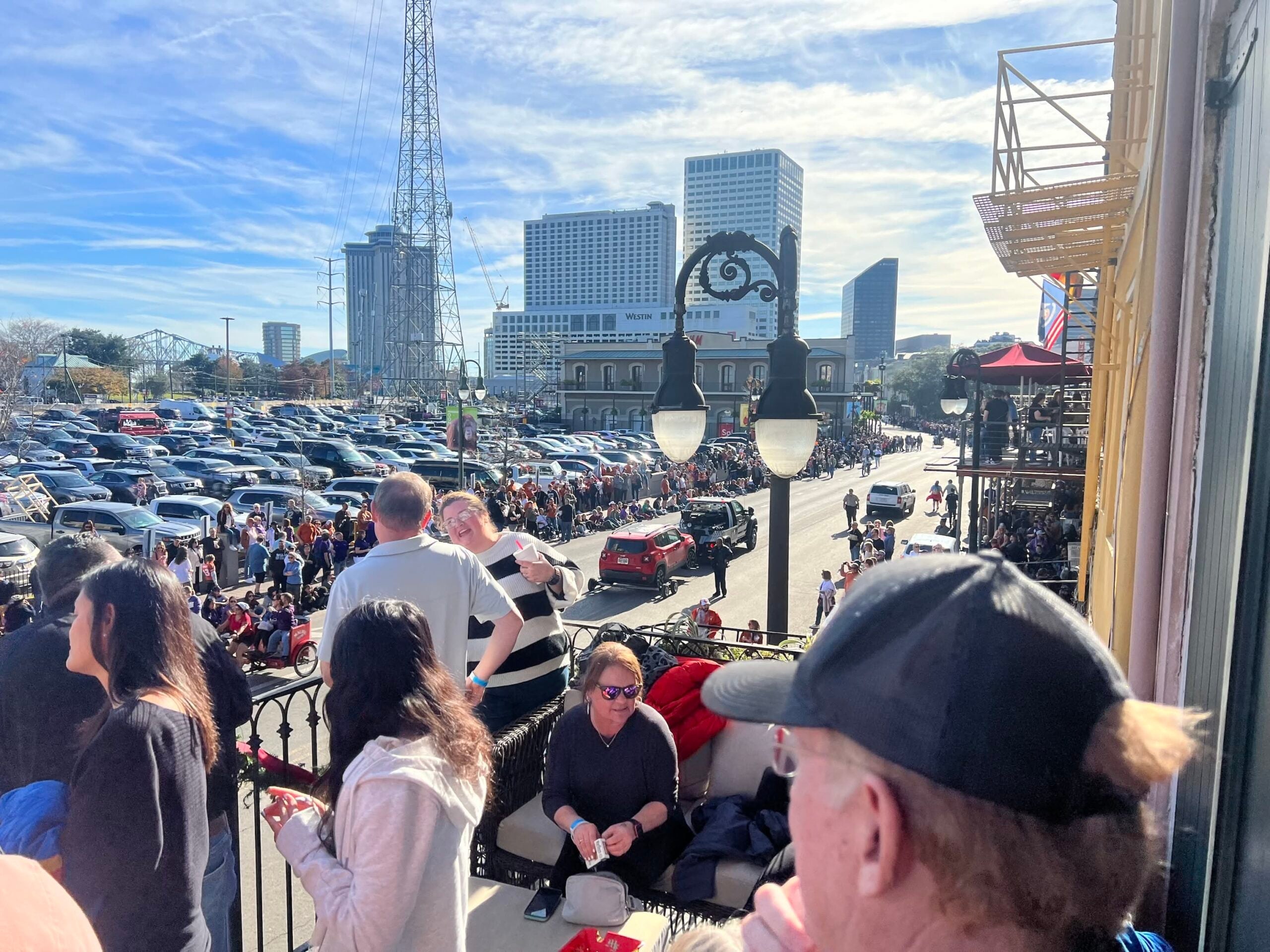 Balcony over a French Quarter parade