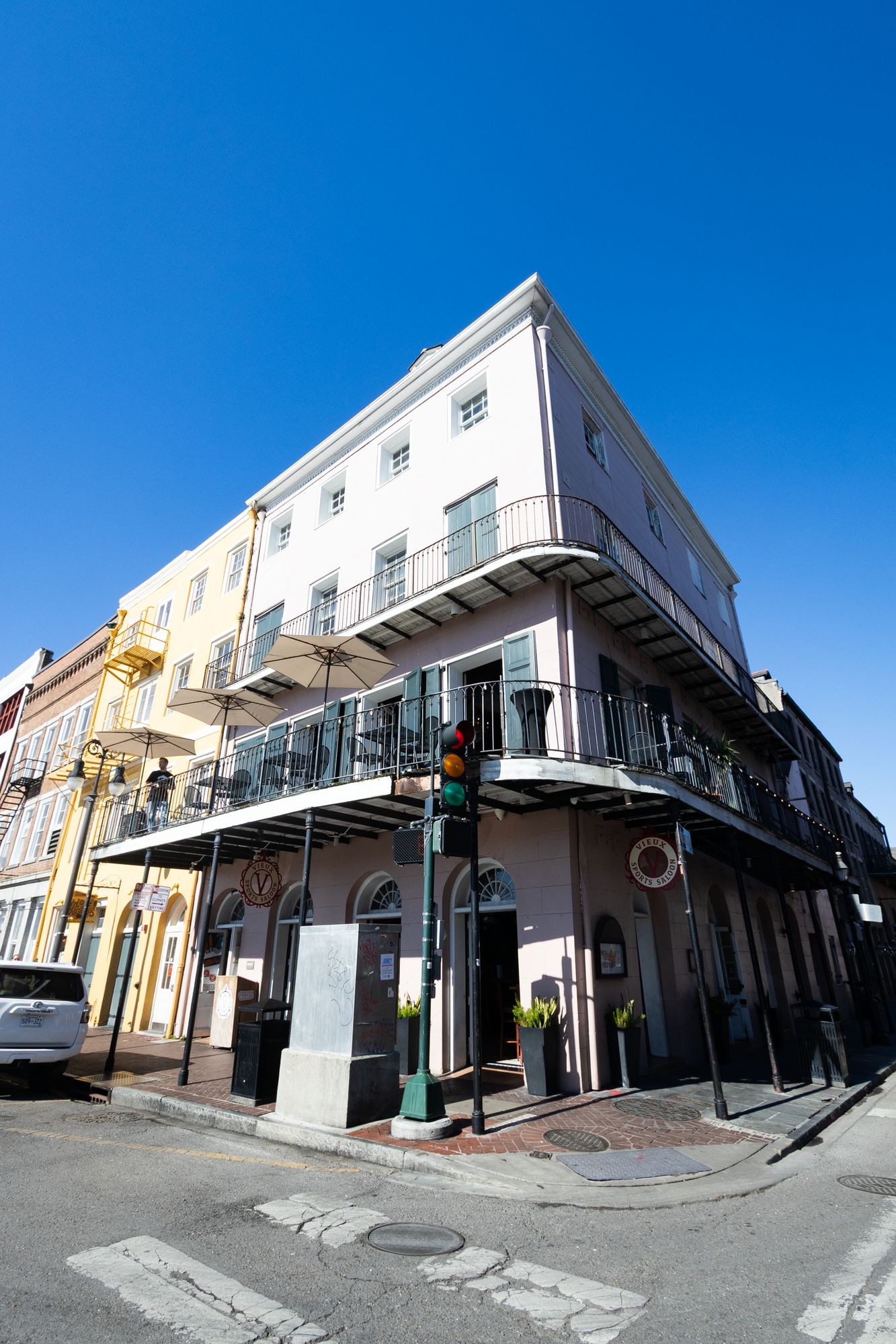 Corner view of the Toulouse Terrace building and its French Quarter balconies